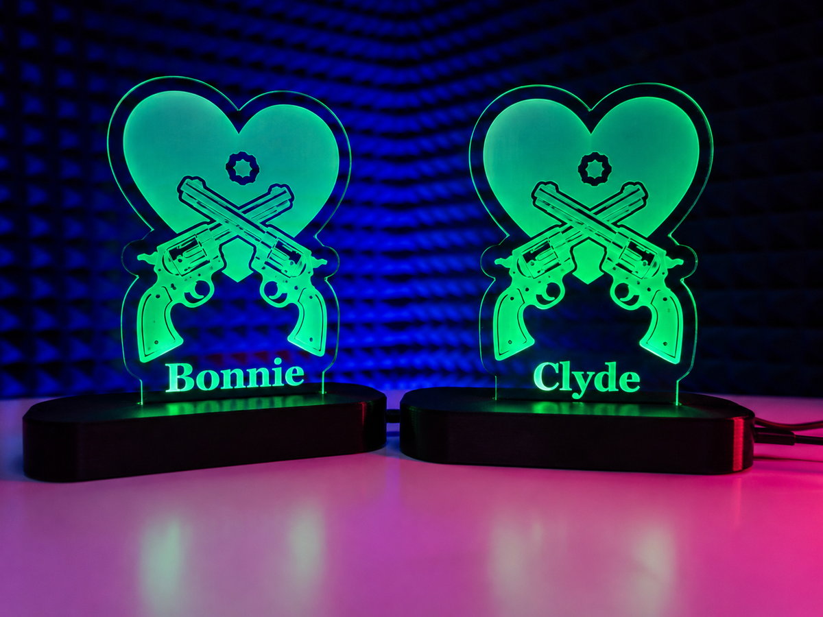 Two Akis displays with personalized Bonnie and Clyde acrylic frames